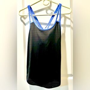 Athleta. Women’s breathable, mesh, workout top. Barely worn. Like new.